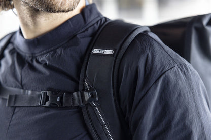 Messenger Pro : sac à dos roll‑top